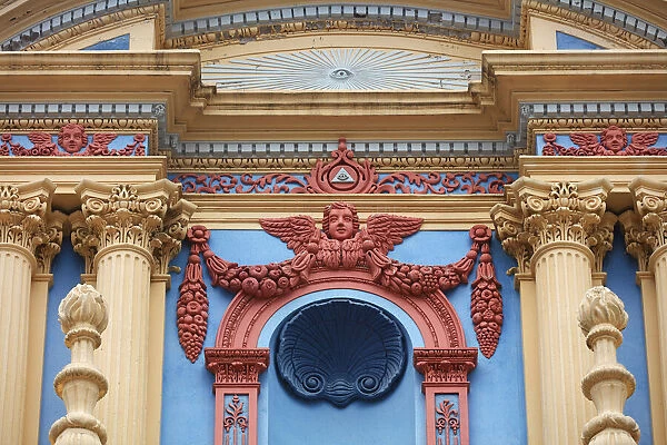 A colourful detail on the main facade of the 'Nuestra Senora de la Candelaria de la Vina' church, Salta, Argentina. The church has a mixed architectural style: Baroque and Italianate