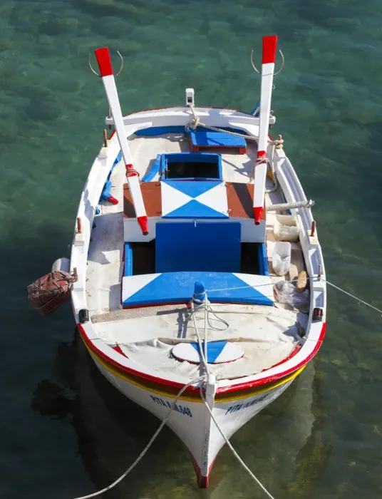 Framed Print : Colourful traditional fishingboat in the small village of Mandraki on the island of Milos Framed Print : Colourful traditional fishingboat in the small village of Mandraki on the island of Milos