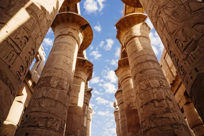 Framed Print : Columns and blue sky at Great hypostyle hall in the Precinct of Amun Re - Karnak Temple