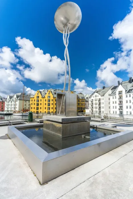 Framed Print : Contemporary art metal sculture and fountain in the city centre of Alesund Framed Print : Contemporary art metal sculture and fountain in the city centre of Alesund