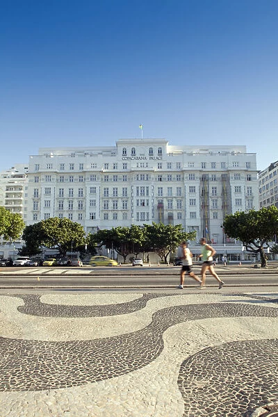 Copacabana Palace Hotel, Avenida Atlantica, Copacabana Beach, joggers in front of