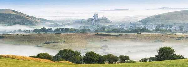 Corfe Castle in the mist, Isle of Purbeck, Dorset, England, UK