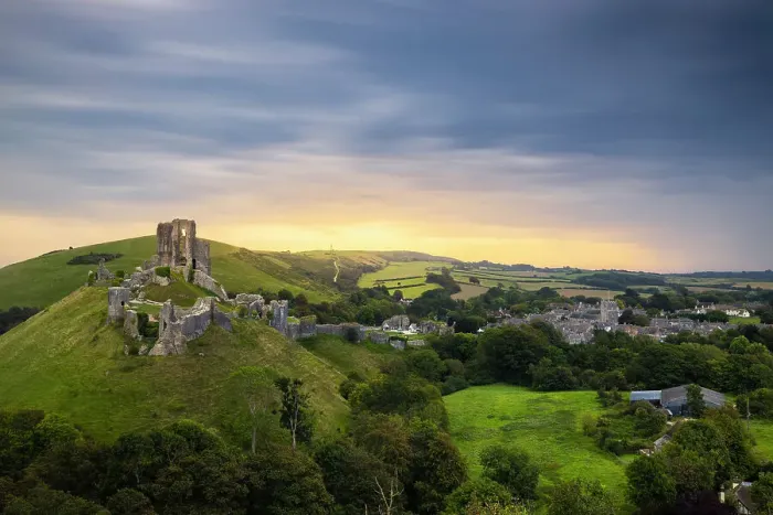Framed Print : Corfe Castle portrayed from hills at sunrise, Corfe Castle, Purbeck, Dorset, England, United Kingdom Framed Print : Corfe Castle portrayed from hills at sunrise, Corfe Castle, Purbeck, Dorset, England, United Kingdom