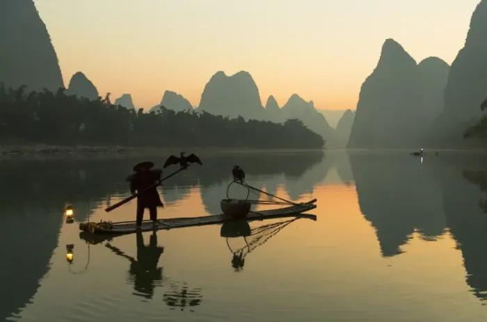 Framed Print : Cormorant fisherman on Li River at dawn, Xingping, Yangshuo, Guangxi, China Framed Print : Cormorant fisherman on Li River at dawn, Xingping, Yangshuo, Guangxi, China