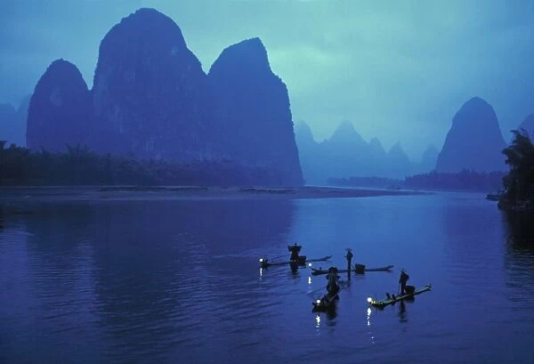 Cormorant fishermen, Xingping, Li River, Guangxi, China