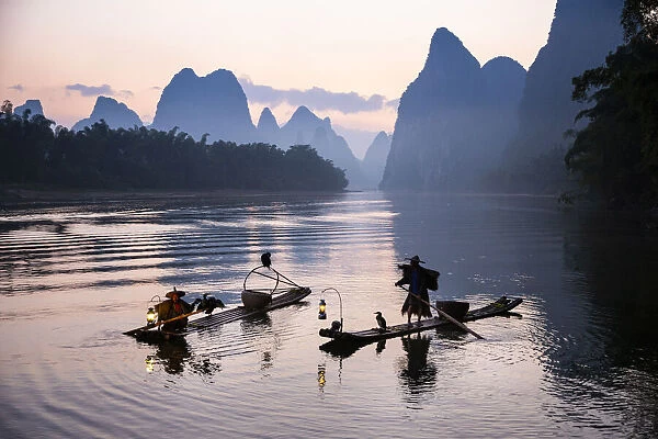 Cormorant fishermen on the Li River, Yangshuo, Guangxi, China