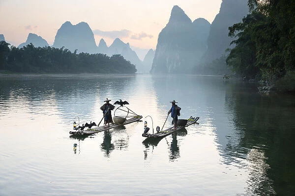Cormorant fishermen on the Li River, Yangshuo, Guangxi, China