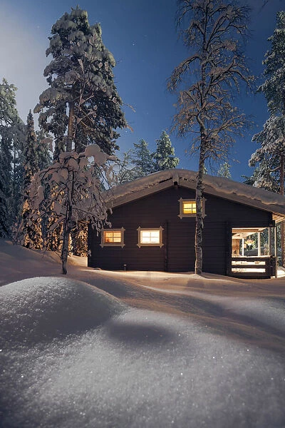 Cottage covered by snow. Sallatunturi. Lapland, Finland