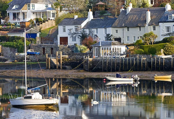 Cottages and boats beside the River Yealm at Newton Ferrers, South Hams, Devon, England