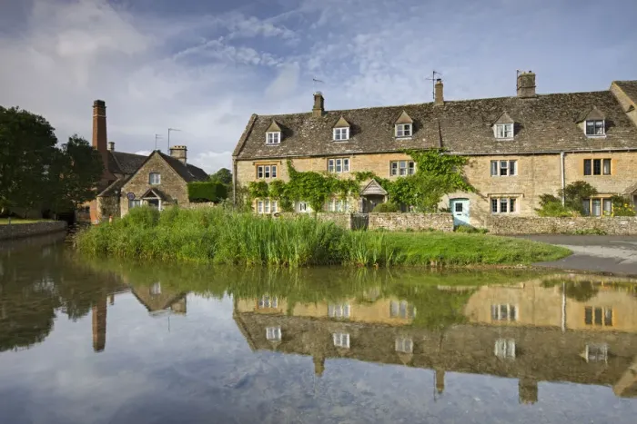 Framed Print : Cottages and old mill beside the River Eye in the Cotswolds village of Lower Slaughter Framed Print : Cottages and old mill beside the River Eye in the Cotswolds village of Lower Slaughter
