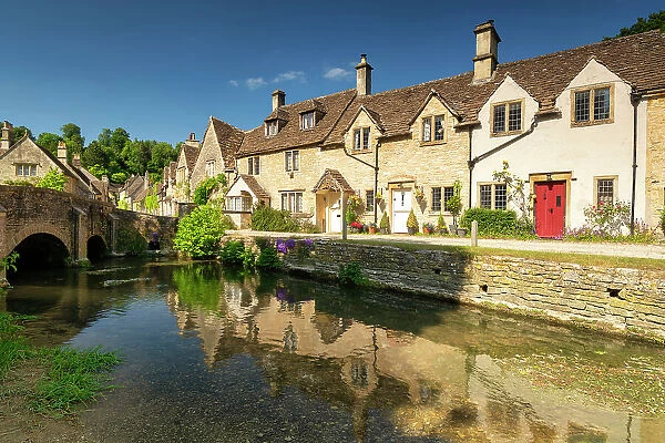 Cottages Reflecting in By Brook, Castle Combe, Wiltshire, England