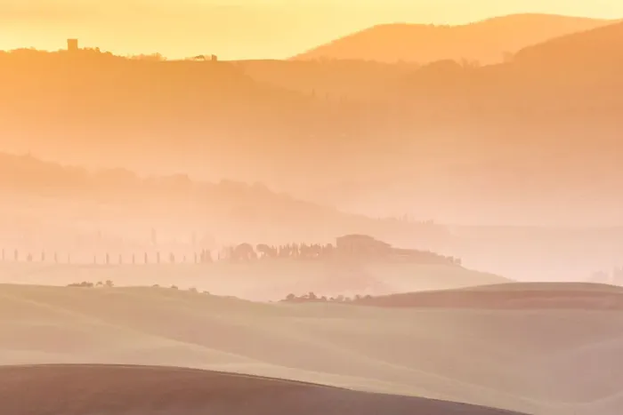 Framed Print : Country layers in backlight, Val d Orcia, Tuscany, Italy Framed Print : Country layers in backlight, Val d Orcia, Tuscany, Italy