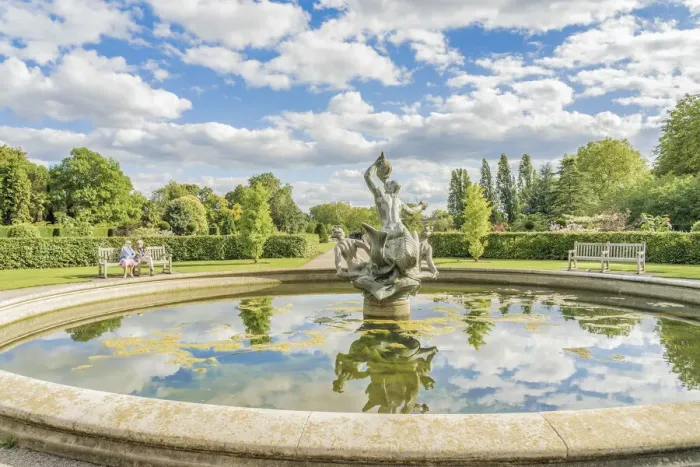 Framed Print : A couple relaxing by the Triton and Dryads Fountain, Regents park, London, England, UK Framed Print : A couple relaxing by the Triton and Dryads Fountain, Regents park, London, England, UK