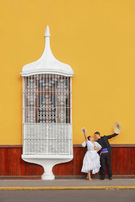 Framed Print : A couple of traditional Marinera'dancers in front of a colonial architecture window of the Plaza de Armas'in Trujillo, La Libertad, Peru. Marinera is the Peruvian National dance. (MR) Framed Print : A couple of traditional Marinera'dancers in front of a colonial architecture window of the Plaza de Armas'in Trujillo, La Libertad, Peru. Marinera is the Peruvian National dance. (MR)