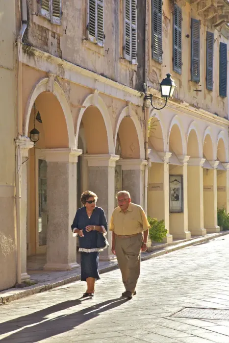 Framed Print : Couple Walking Through Corfu Old Town, Corfu, The Ionian Islands, Greek Islands, Greece Framed Print : Couple Walking Through Corfu Old Town, Corfu, The Ionian Islands, Greek Islands, Greece