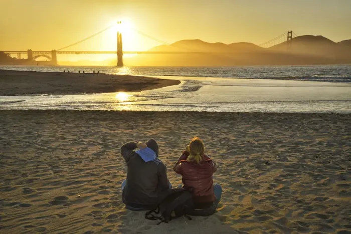 Framed Print : Couple watching sunset at Golden Gate Bridge, Crissy Field, San Francisco, California Framed Print : Couple watching sunset at Golden Gate Bridge, Crissy Field, San Francisco, California