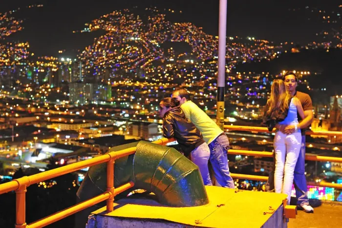 Framed Print : Couples viewing Medellin at night, Colombia, South America Framed Print : Couples viewing Medellin at night, Colombia, South America