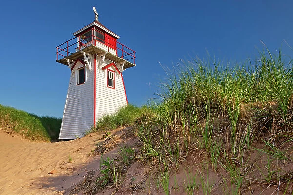 Covehead Harbour Lighthouse along the dunes at Covehead Harbour Prince Edward Island National Park, Prince Edward Island, Canada