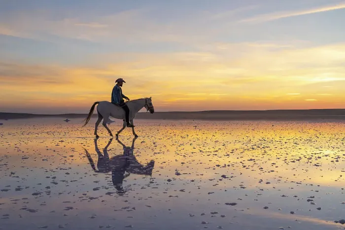 Framed Print : Cowboy riding horse on salt Lake Tuz at sunset, Karamollausagi, Sereflikochisar, Ankara Province, Central Anatolia Region, Turkey Framed Print : Cowboy riding horse on salt Lake Tuz at sunset, Karamollausagi, Sereflikochisar, Ankara Province, Central Anatolia Region, Turkey
