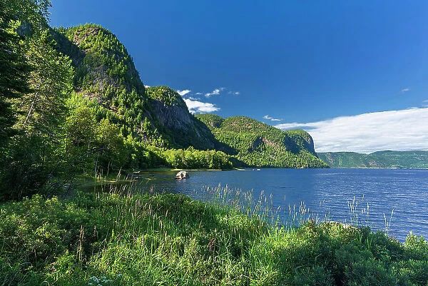 Craggy mountains and cliffs along the Saguenay River. Laurentian Highlands. Parc national du Fjord-du-Saguenay Quebec, Canada