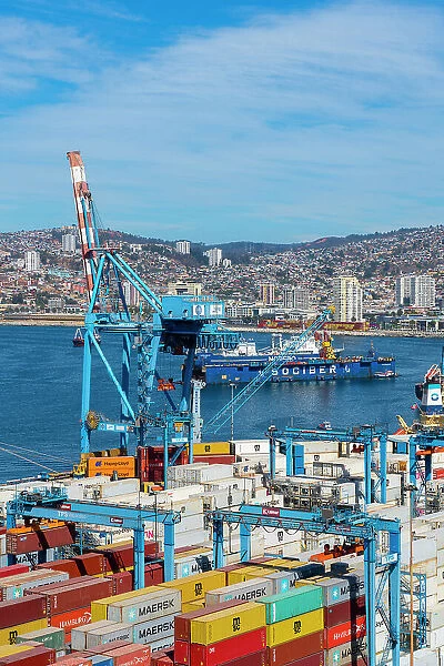 Cranes and cargo containers stacked at Port of Valparaiso, Caleta Portales, Valparaiso, Valparaiso Province, Valparaiso Region, Chile