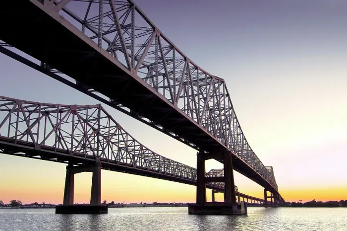 Framed Print : Crescent City Connection are twin cantilever bridges that cross over the lower Mississippi River in New Orleans. Louisiana, USA Framed Print : Crescent City Connection are twin cantilever bridges that cross over the lower Mississippi River in New Orleans. Louisiana, USA