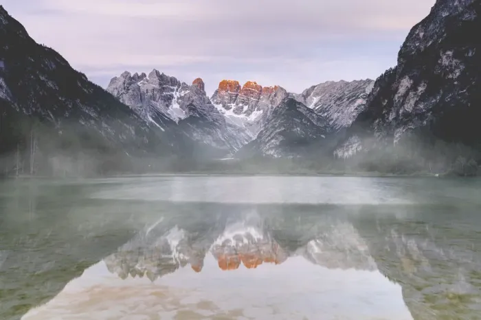 Framed Print : Cristallo and Popena group reflecting in lake Landro during a misty sunset, Dolomites