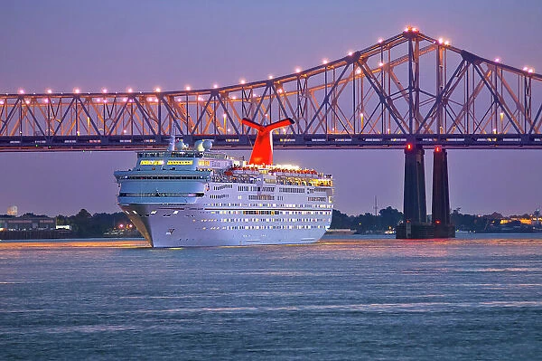 Cruise ship departing the Port of New Orleans on the Mississippi River. Louisiana, USA
