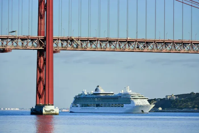 Framed Print : A cruise ship in the Tagus river, leaving the port of Lisbon, passes beneath the 25 Framed Print : A cruise ship in the Tagus river, leaving the port of Lisbon, passes beneath the 25