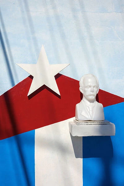 Cuba, Havana, Cuban flag and Jose Marti bust