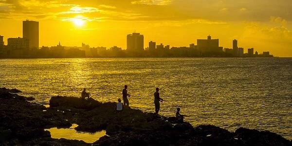 Cuba, Havana, The Malecon, Man fishing