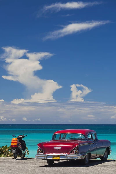 Cuba, Matanzas Province, Varadero, Varadero Beach with 1958 US-made Cheverlot