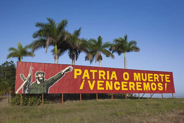 Cuba, Pinar del Rio Province, Pinar del Rio, roadside patriotic mural with Fidel Castro