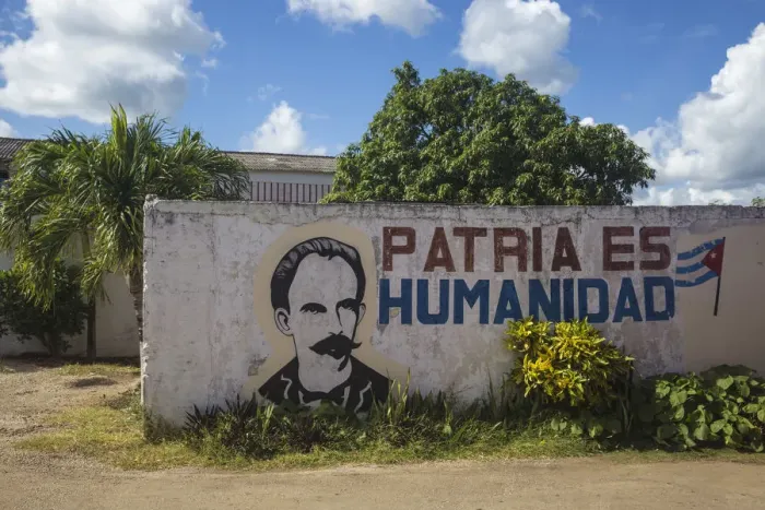 Framed Print : Cuba, Villa Clara province, Remedios, Bus station, Revolutionary slogan painted on wall Framed Print : Cuba, Villa Clara province, Remedios, Bus station, Revolutionary slogan painted on wall
