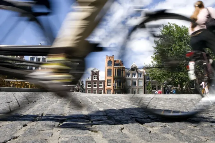 Framed Print : Cyclist, Amsterdam, the Netherlands Framed Print : Cyclist, Amsterdam, the Netherlands