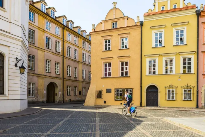 Framed Print : Cyclist in Old Town, Warsaw, Poland, Europe Framed Print : Cyclist in Old Town, Warsaw, Poland, Europe