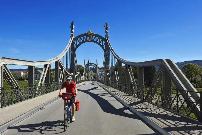 Framed Print : Cyclists on the countries bridge between Bavaria and Salzburg, running, Chiemgau Framed Print : Cyclists on the countries bridge between Bavaria and Salzburg, running, Chiemgau