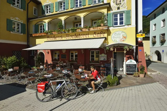 Framed Print : Cyclists paused outside the cafe Cupid Marktschellenberg, Berchtesgaden, Upper Bavaria Framed Print : Cyclists paused outside the cafe Cupid Marktschellenberg, Berchtesgaden, Upper Bavaria