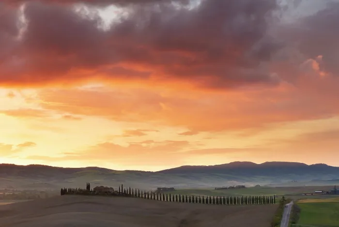 Framed Print : Cypress trees and farmhouse (Poggio Covili) at sunrise beneath a colourful sky, near San Quirico d'Orcia, Tuscany, Italy