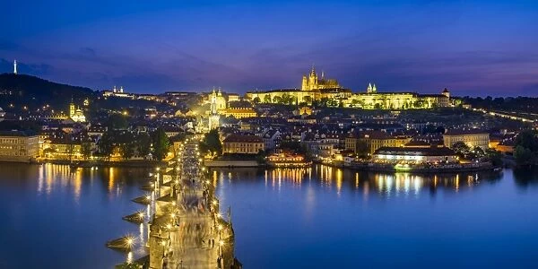 Czech Republic, Prague. Charles Bridge and Pague Castle on the Vltava River at dusk