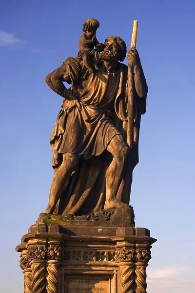 Czech Republic, Prague; One of the thirty statues on Charles Bridge