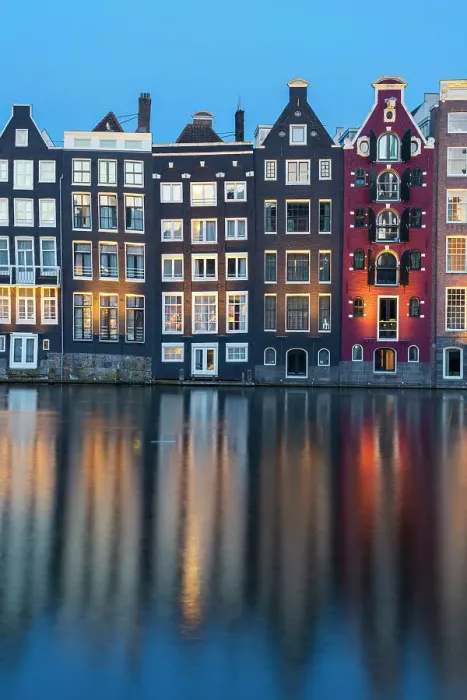 Framed Print : Dancing houses near river at twilight, Damrak, Amsterdam, Netherlands
