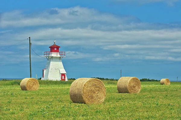 Darnley Lighthouse and bales Darnley, Prince Edward Island, Canada