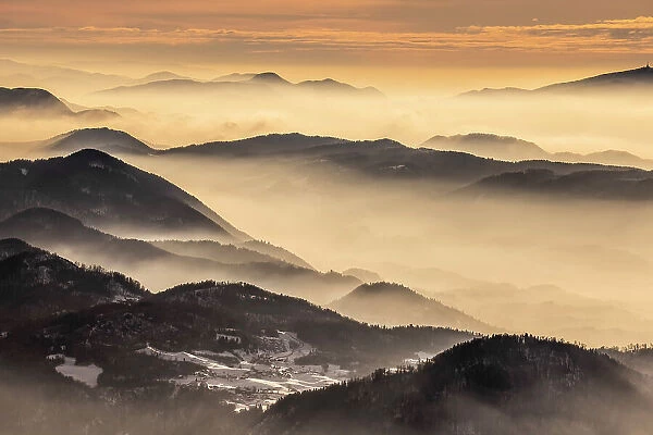 Dawn over the foothills of the Kamnik Savinja Alps from Kravavec, Slovenia