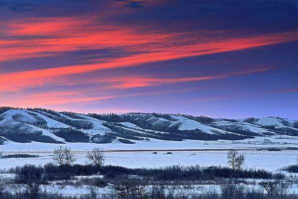 Dawn light on the hills of the Qu Appelle Valley in winter near Craven Saskatchewan, Canada