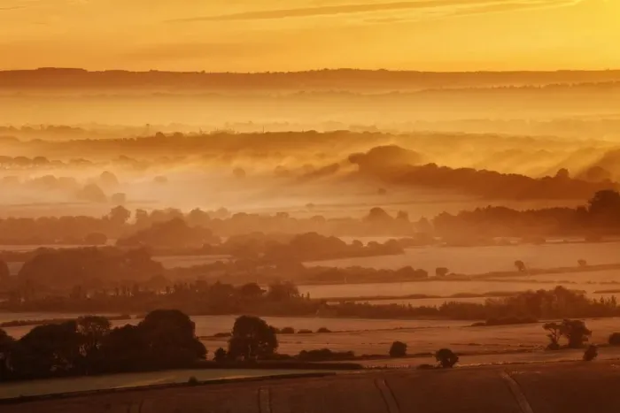 Framed Print : Dawn mist and rolling chalk downland viewed from Wilmington Hill, Willmington Framed Print : Dawn mist and rolling chalk downland viewed from Wilmington Hill, Willmington