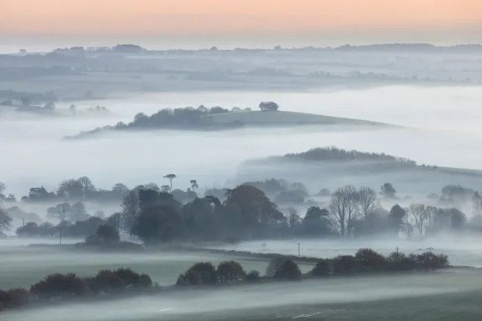 Framed Print : Dawn mist around Windmill Hill near Alvediston, Cranborne Chase, Wiltshire, England, UK Framed Print : Dawn mist around Windmill Hill near Alvediston, Cranborne Chase, Wiltshire, England, UK