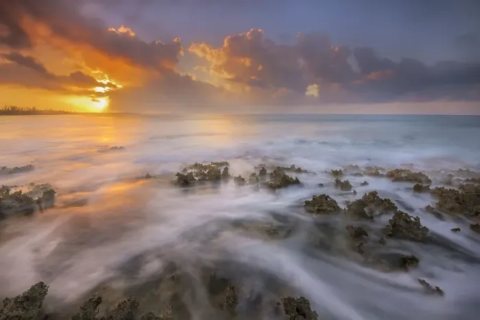 Framed Print : Daybreak on the Caribbean Sea along the rugged ironshore of Grand Cayman in the Cayman Islands, British West Indies Framed Print : Daybreak on the Caribbean Sea along the rugged ironshore of Grand Cayman in the Cayman Islands, British West Indies