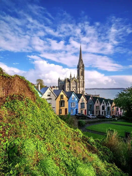 Framed Print : Deck of Cards colourful houses and St. Colman's Cathedral, elevated view, Cobh, County Cork, Ireland Framed Print : Deck of Cards colourful houses and St. Colman's Cathedral, elevated view, Cobh, County Cork, Ireland