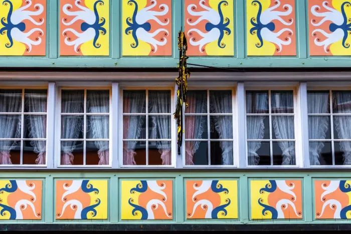 Framed Print : Decorations on the facades of village houses, Appenzell, Canton of Appenzell, Alpstein
